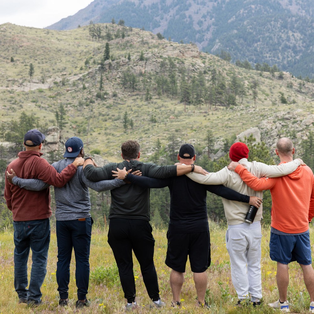 Tom Sylvester with friends in the mountains
